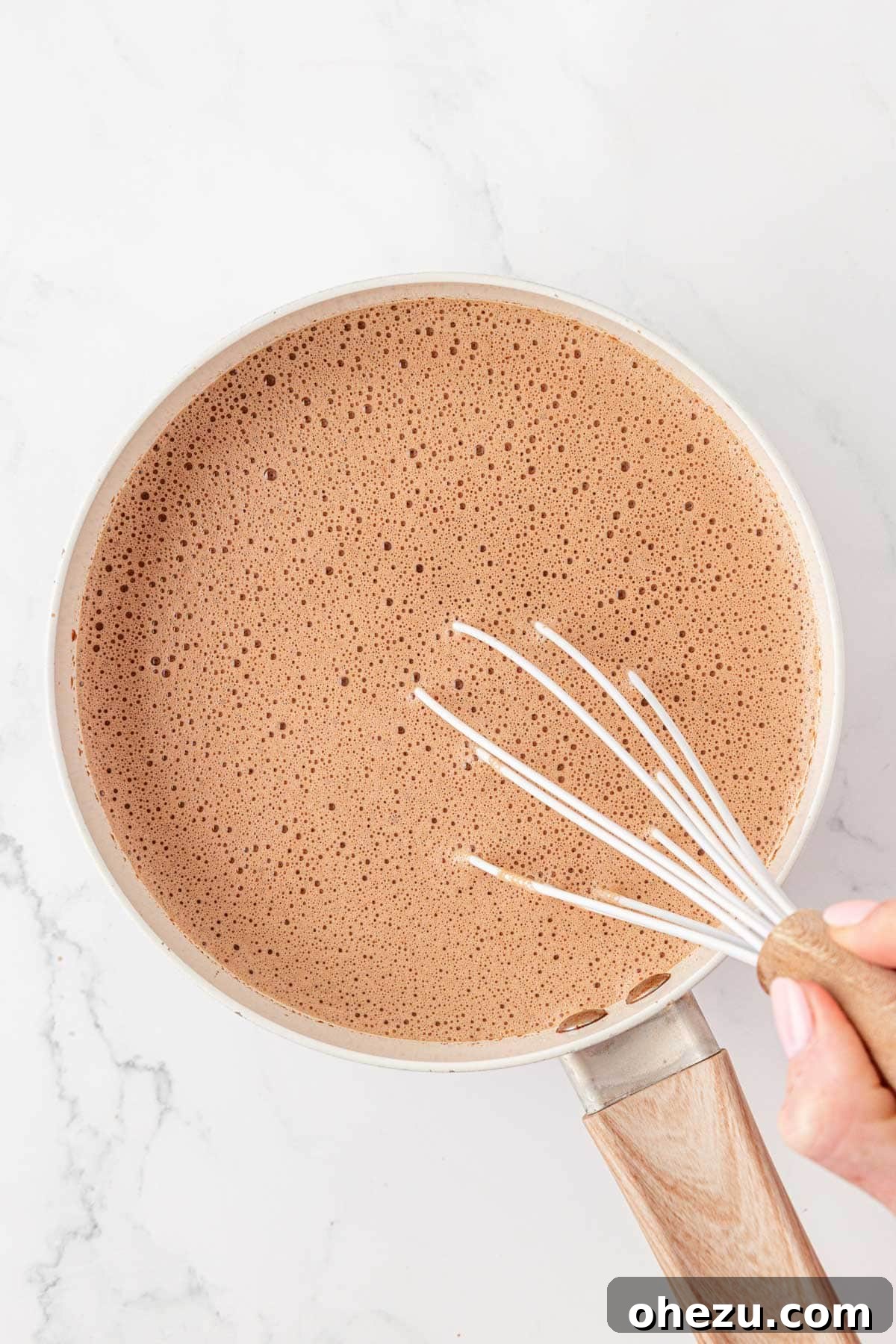 How to Make Rich Homemade Hot Chocolate 8 whisking the hot chocolate